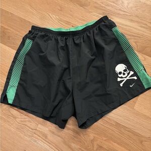 Nike Black and Green Athletic Shorts with Skull Design